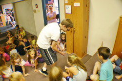 Gabe letting students touch a snake